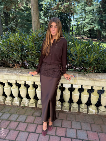 Front view of chocolate brown slip skirt with lace overlay