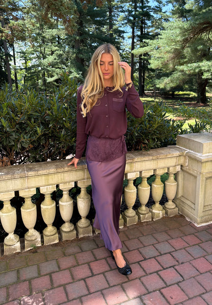 Front view of plum slip skirt with lace overlay