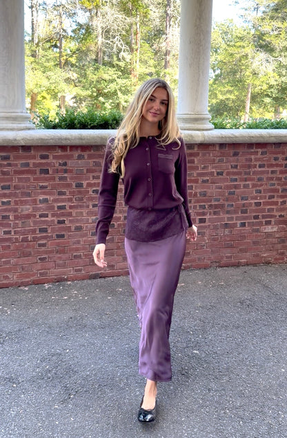 In motion view of plum slip skirt with lace overlay