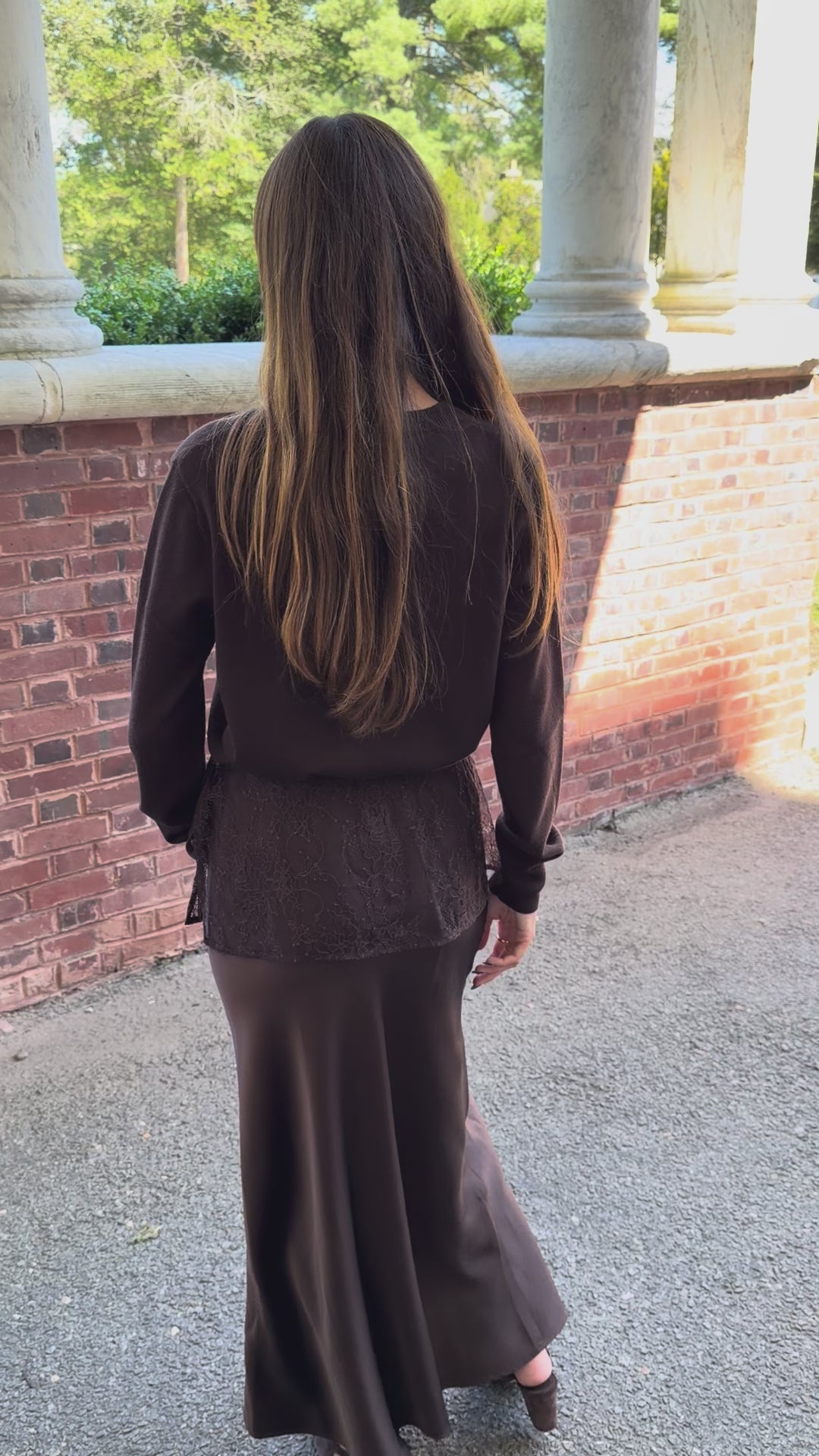 Back to front view of chocolate brown slip skirt with lace overlay