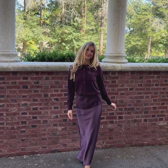 In motion video of plum slip skirt with lace overlay